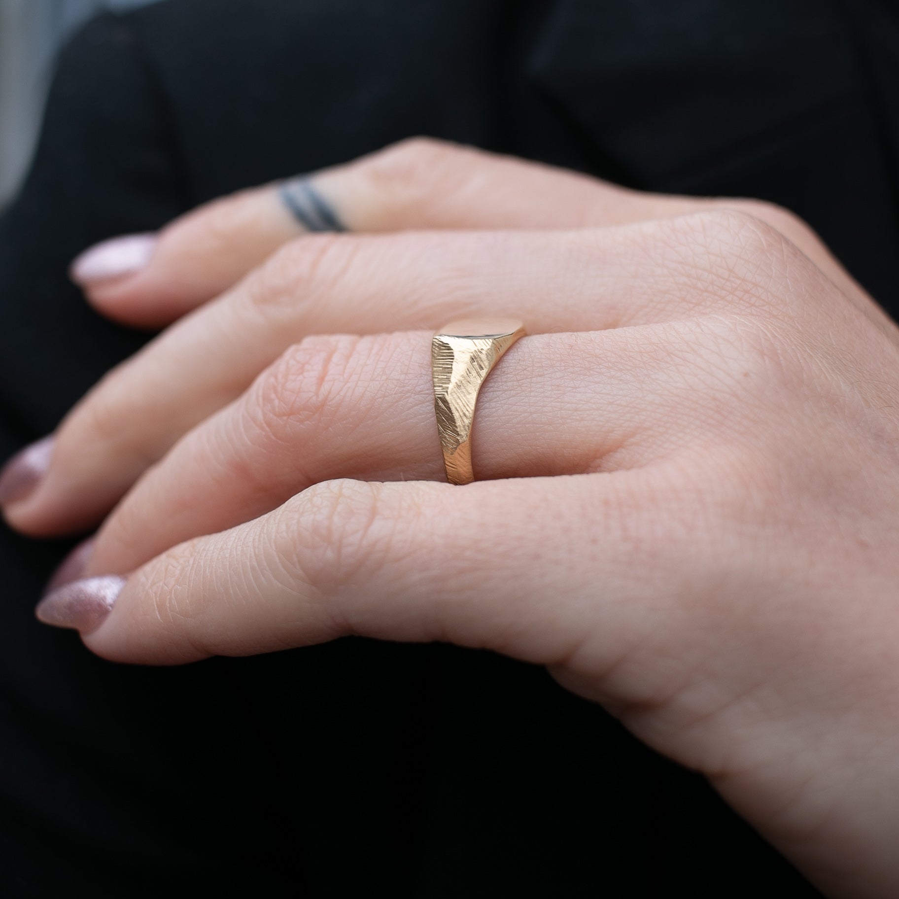 Handmade petite carved signet ring in 18kt yellow gold.