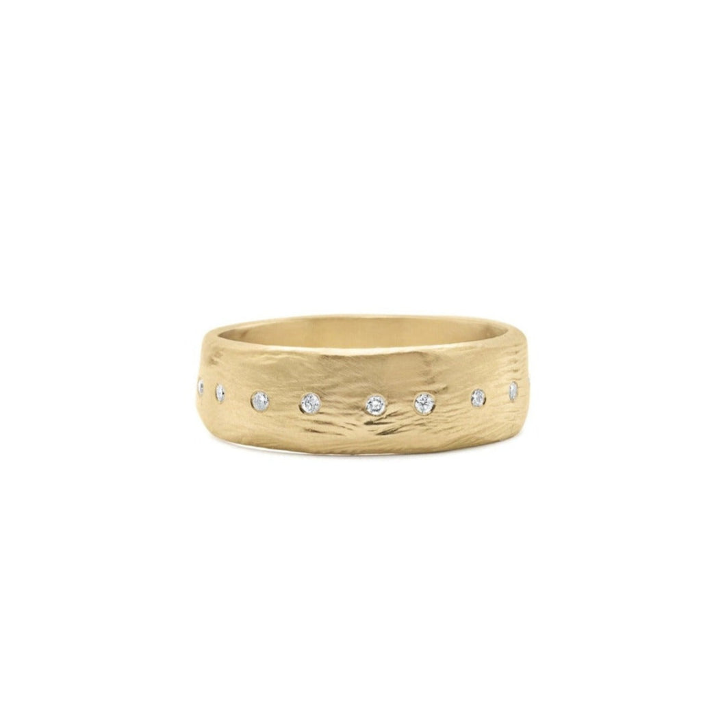 Handmade 18kt gold ring with a row of diamonds. Alternative engagement ring or wedding band.