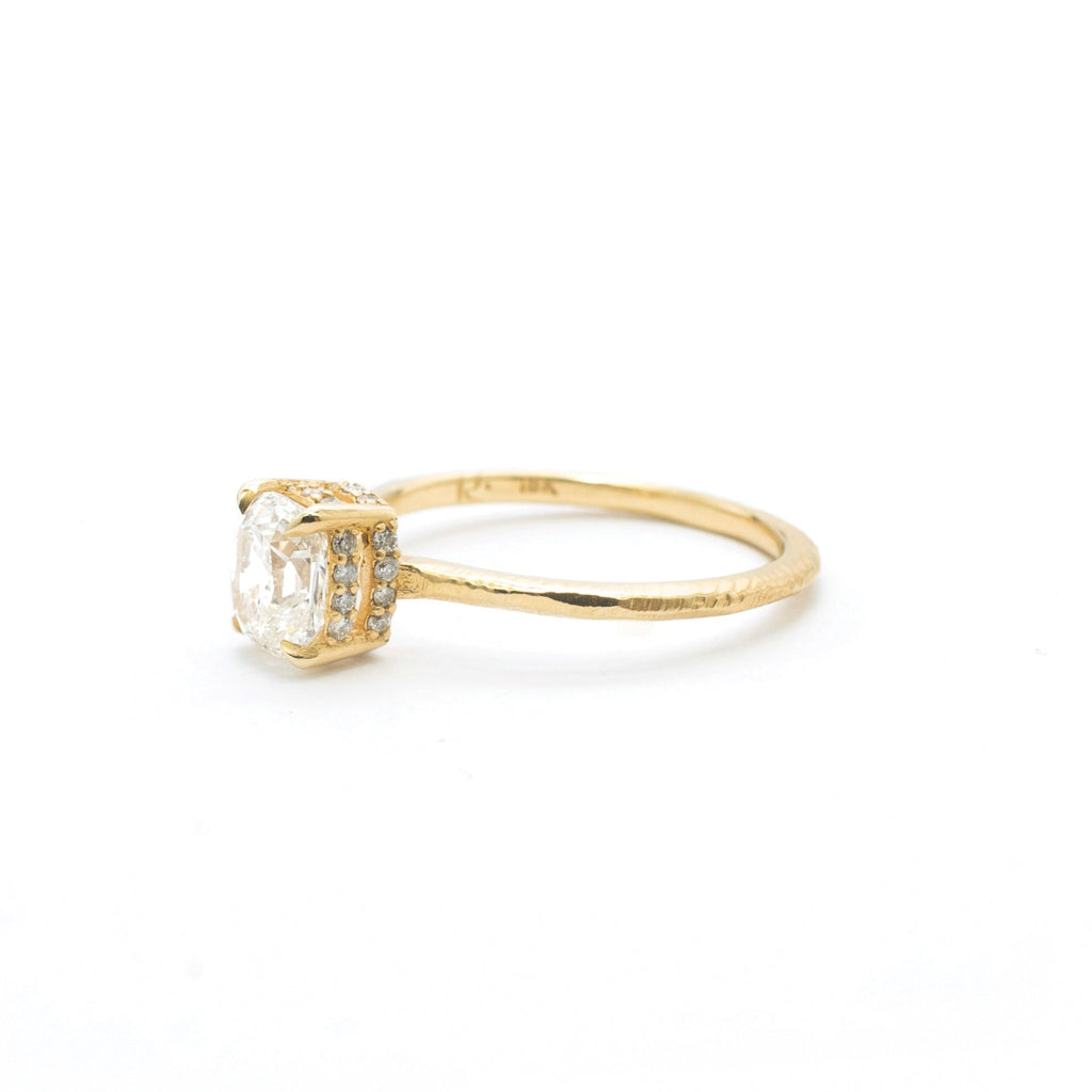 Handmade 18kt gold engagement ring with old mine cut diamond.