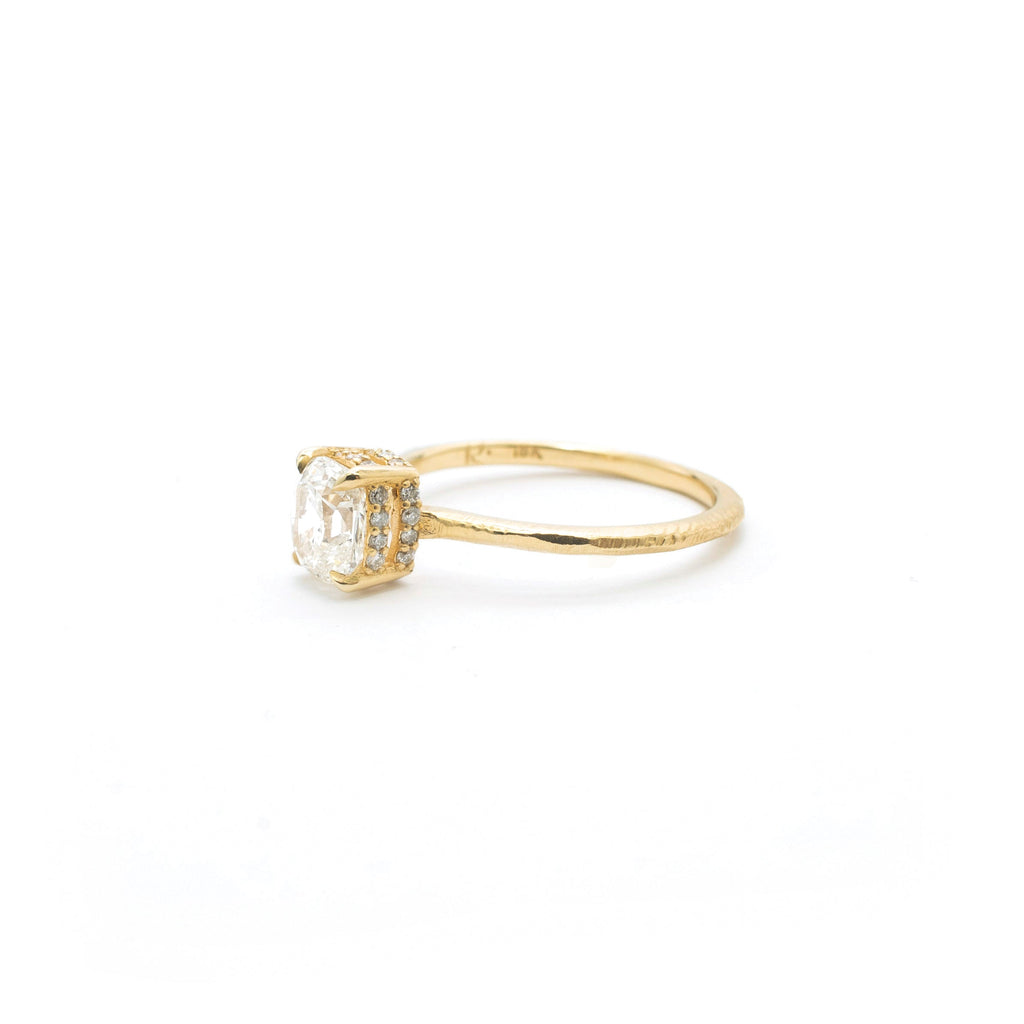 Handmade 18kt gold engagement ring with old mine cut diamond.