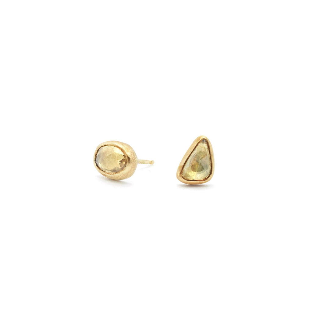 Freeform yellow sapphire studs made from 18kt gold.