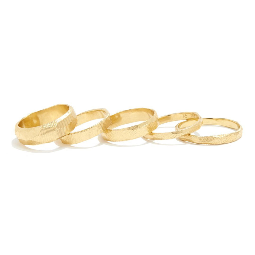 Handcarved 18kt gold wedding bands in 2mm, 3mm, 4mm, 5mm, and 6mm widths.