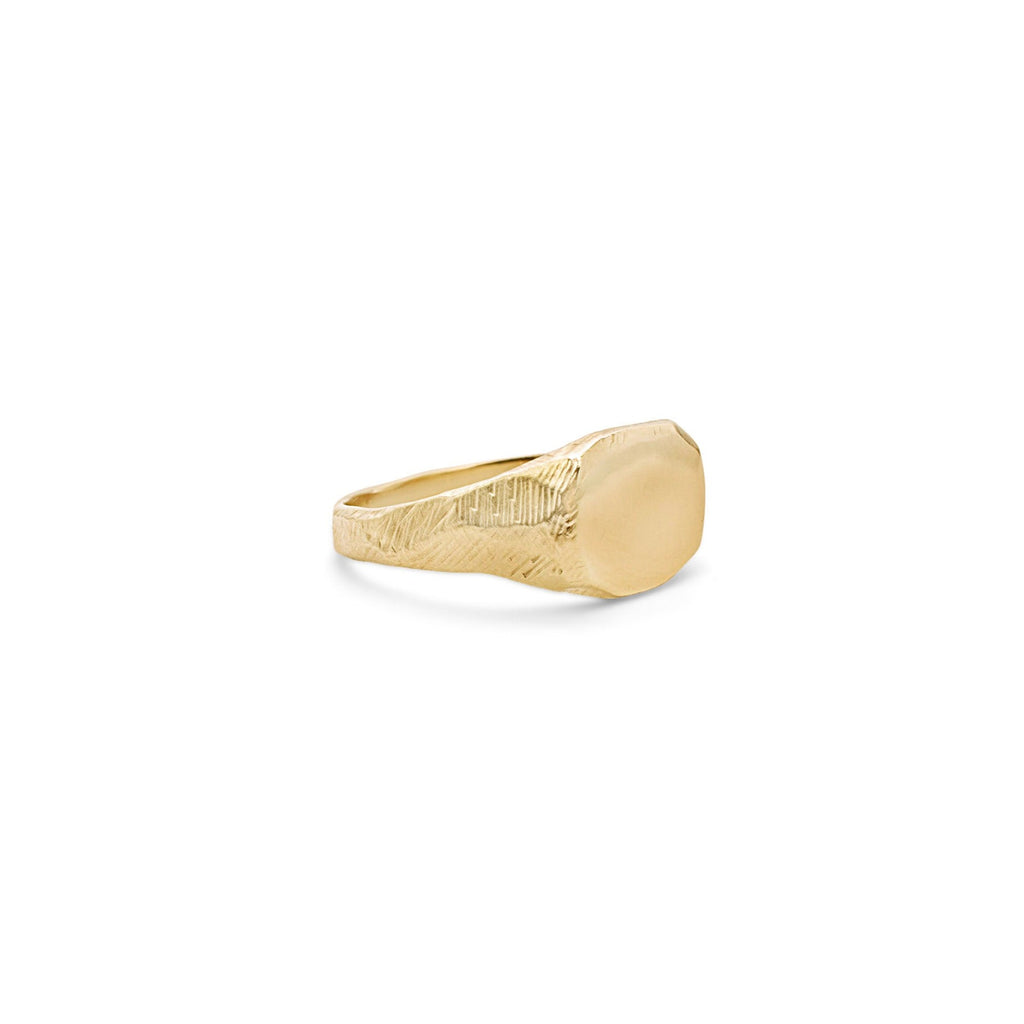 Handmade petite carved signet ring in 18kt yellow gold.