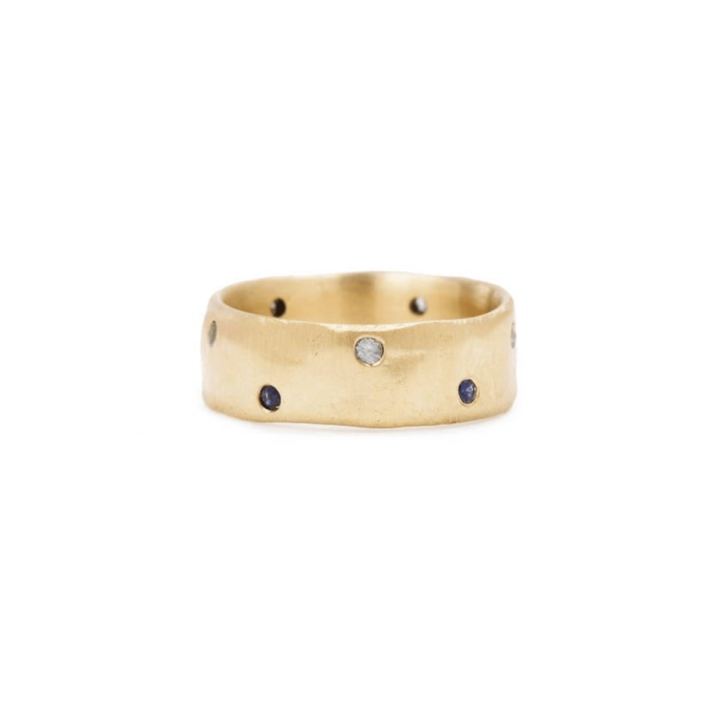 Handmade 18kt gold ring with diamonds and blue sapphires.