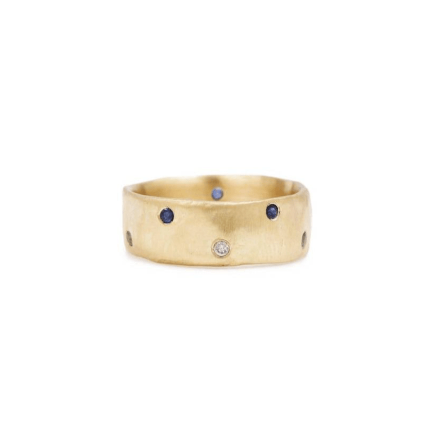 Handmade 18kt gold ring with diamonds and blue sapphires.