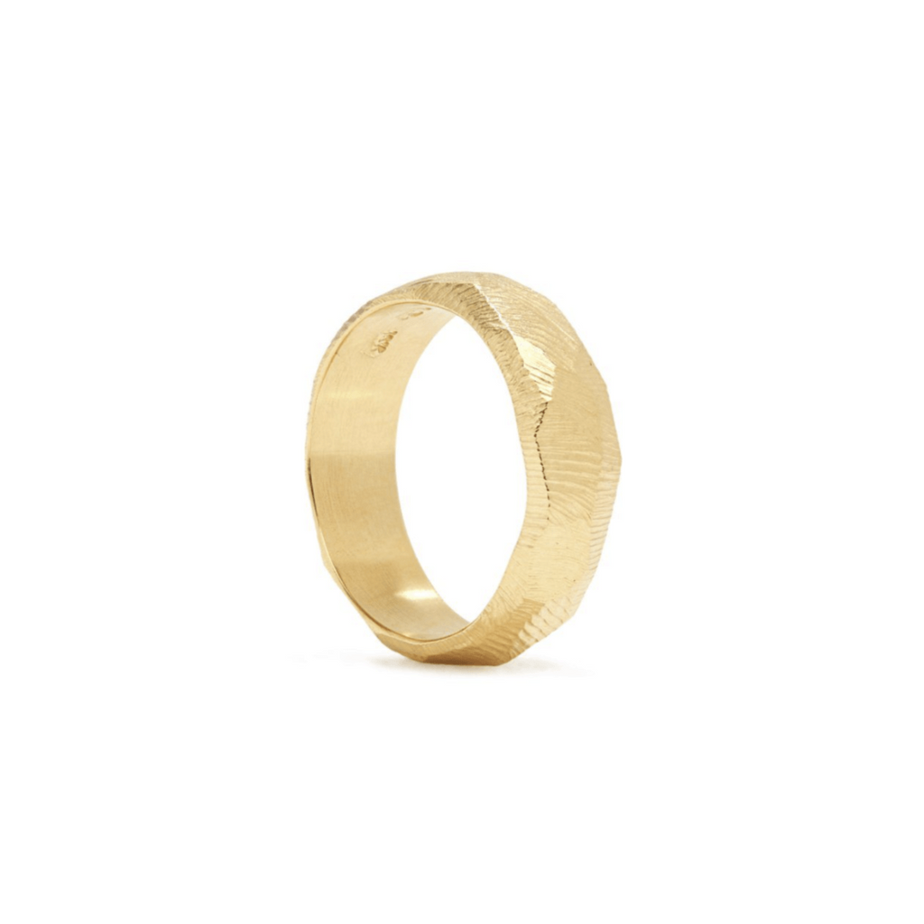 Handmade wedding band in 18kt gold with a 6mm width and hand carved texture.