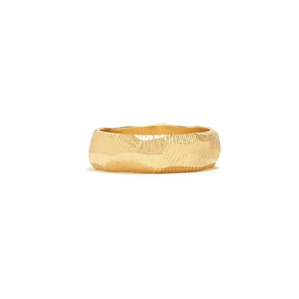 Handmade wedding band in 18kt gold with a 6mm width and hand carved texture.