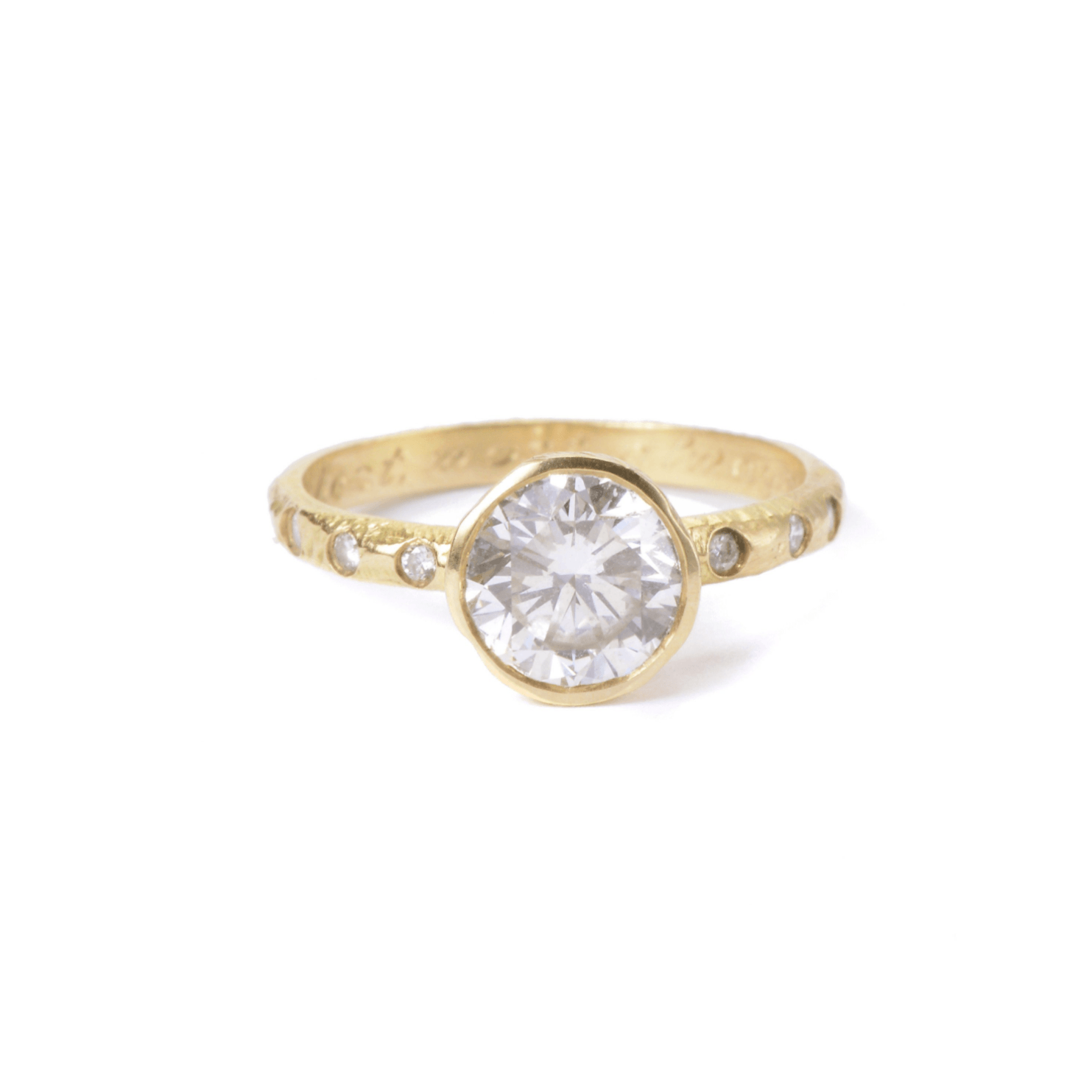 Custom diamond engagement ring with side diamonds and texture. Handmade in 18kt gold in Brooklyn.